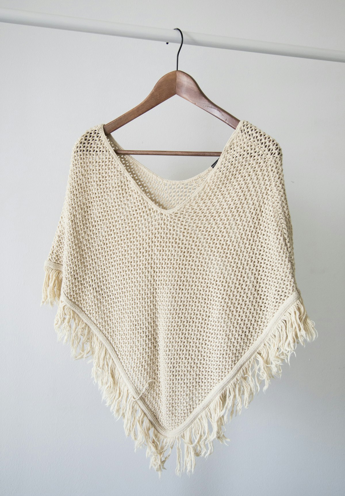 Garments hanging in the shop, warm light